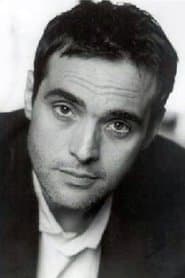 Christian Moro as CRS TV Journalist