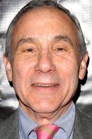 Lloyd Kaufman as Prisoner (uncredited)
