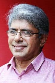 Balachandran Chullikkadu as Vineeth's Grandfather