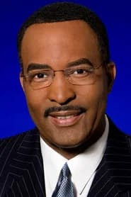 Ukee Washington as TV News Anchor