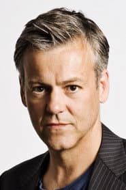 Rupert Graves as Dominic