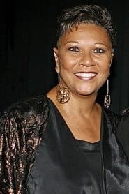 Dierdre Downing-Jackson as Business Woman on Plane