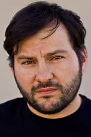 Oscar Avila as Mexican Border Guard