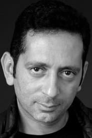 Omar Mostafa as Falafel Stand Vendor
