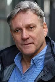 John Chancer as Police Commander