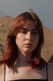 Flora Nolan as Girl on Truck