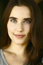 Alix Angelis as Tea Party Guest (uncredited)