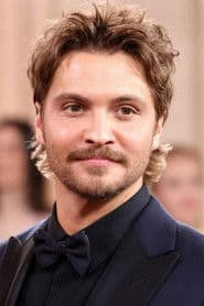 Luke Grimes as Elliot Grey