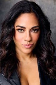 Sharon Carpenter as Metro News Reporter