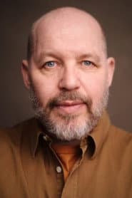 Gordon Peaston as Councillor Spalding