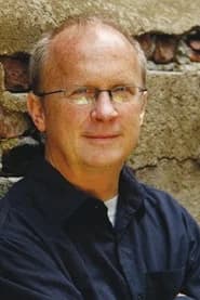 Joseph P. Reidy as Priest w/ Young Colin