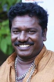 Karunas as 'Mama' Ratnam