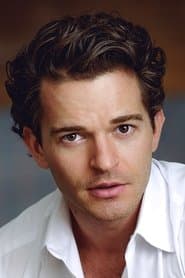 Dominic Allburn as Marc Schreiber