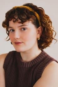 Nina White as KCXE Assistant