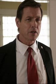 Brent Mendenhall as President George W. Bush