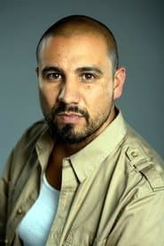 Rolando Gonzalez as Cartel (uncredited)