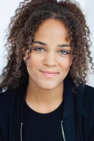 Chanel Mings as Restaurant Hostess