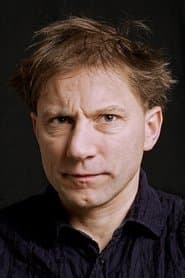 Simon McBurney as Maurice Grosse