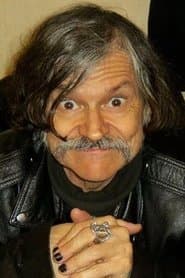 John Link as Manholio Bar Manager