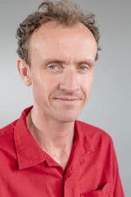 Ed Malone as The Sun Reporter