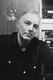 Steve Mackey as Band Bass Guitar