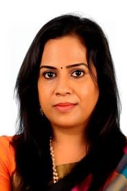 Lizzie Antony as Ratnam's Wife