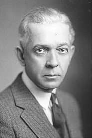 John Elliott as Bank Director (uncredited)