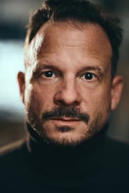 Neil Cole as Racing Instructor