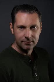 Nathan Benham as Bank Guard