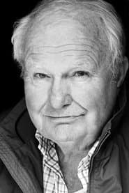 Shane Rimmer as Older Gotham Water Board Technician