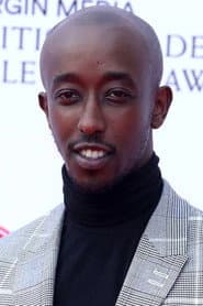 Roger Jean Nsengiyumva as Youth Baggage Handler #1