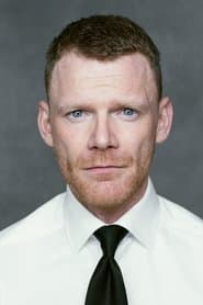 Richard Sutton as G.U.N. HQ Security Guard
