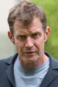 Jason Flemyng as Travis