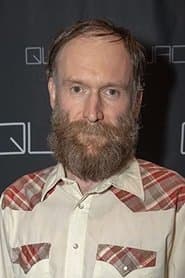 Mark Ashworth as Security Guard