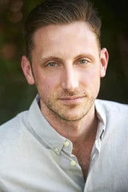 Max Walker as TV Anchor
