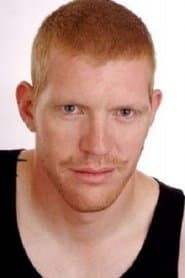 Reuben De Jong as Father (Suit)