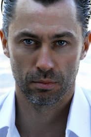 Christophe Dupuis as CIA Operative, Madrid