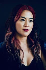 Stephanie Yu as Party Band Bass Player