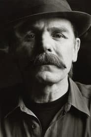 Tam White as MacGregor