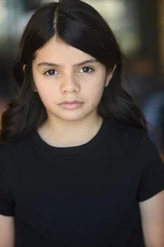 Isabella Aparicio as Young Family Girl