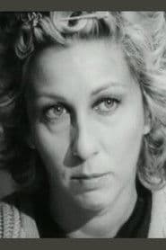 Nora Ricci as Gloria's Secretary (segment "La strega bruciata viva")
