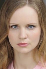 Katrina Despain as Kim Milland (uncredited)