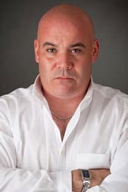 Roy James Wilson as C.O. Jim