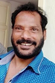Lollu Sabha Maaran as S. Kumaran