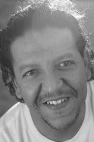 Hafid Abdelmoula as Funeral Driver (uncredited)