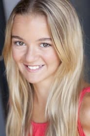 Madison Moran as Train Station Family (Daughter)