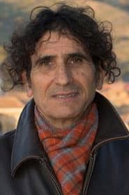 Emanuele Gullotto as Record Shopkeeper