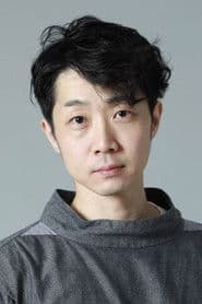 Mikio Ueda as Man on Train