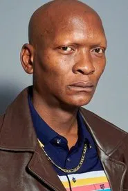 Warren Masemola as Bald Old Man