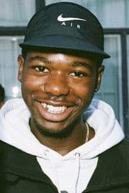 Eric Manaka as Self (archive footage)